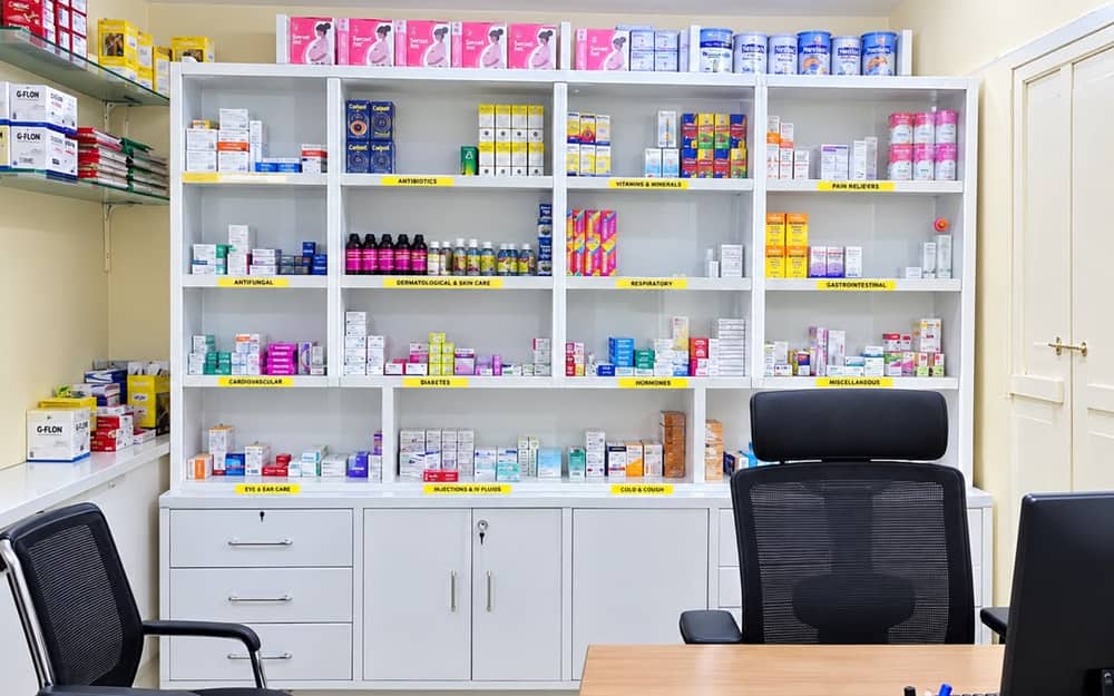 Khusho Health Center pharmacy with labelled medicine shelves and dispensing desk